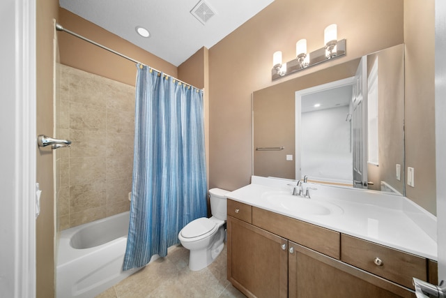 bathroom with tile patterned floors, toilet, vanity, visible vents, and shower / tub combo