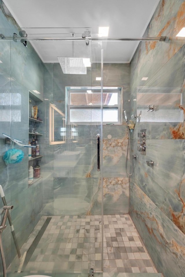 full bath featuring a stall shower