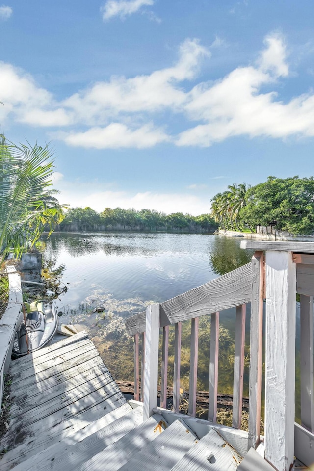 exterior space with a water view