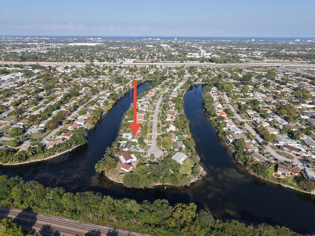 bird's eye view with a residential view and a water view