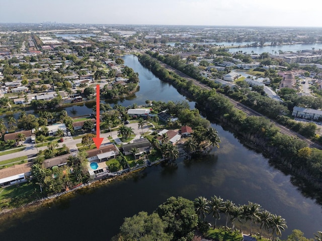 aerial view featuring a residential view and a water view