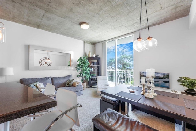 300 S Australian Ave Unit 717, West Palm Beach, FL 33401 - living room featuring expansive windows and carpet flooring