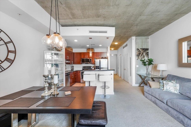 300 S Australian Ave Unit 717, West Palm Beach, FL 33401 - dining room featuring light carpet