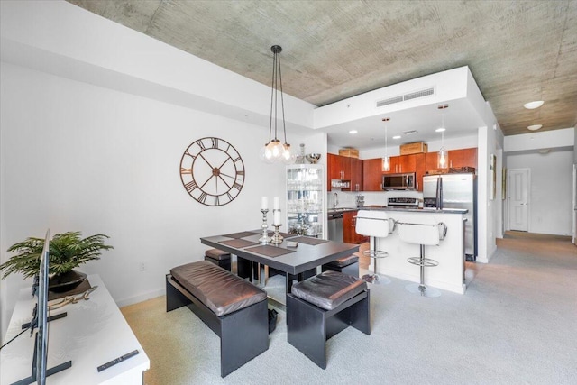 300 S Australian Ave Unit 717, West Palm Beach, FL 33401 - dining area featuring light carpet and recessed lighting