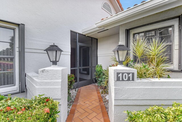 exterior space featuring stucco siding