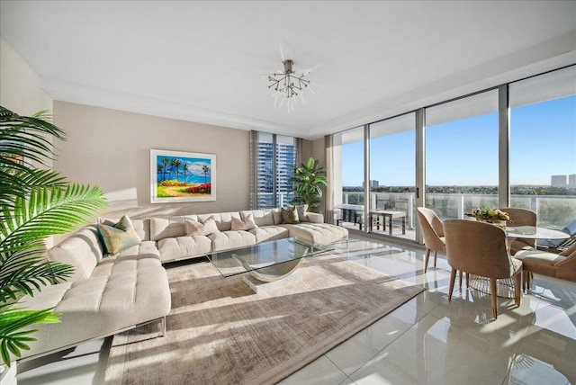 5000 N Ocean Dr Unit 603, Singer Island, FL 33404 - tiled living area with expansive windows and a notable chandelier