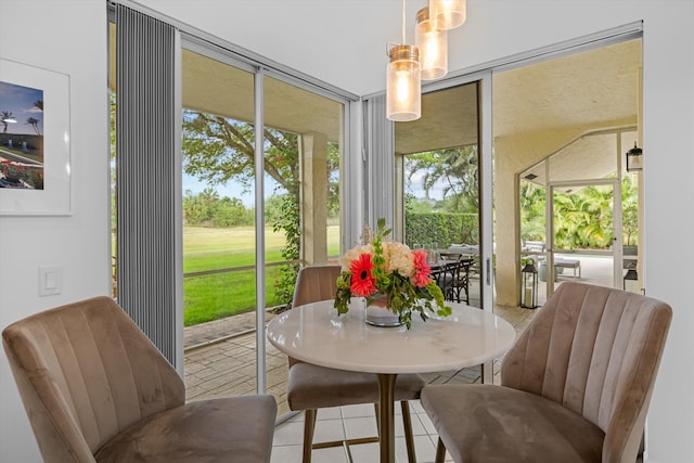 11851 Pebblewood Dr, Wellington, FL 33414 - sunroom / solarium featuring tile patterned floors and outdoor dining space