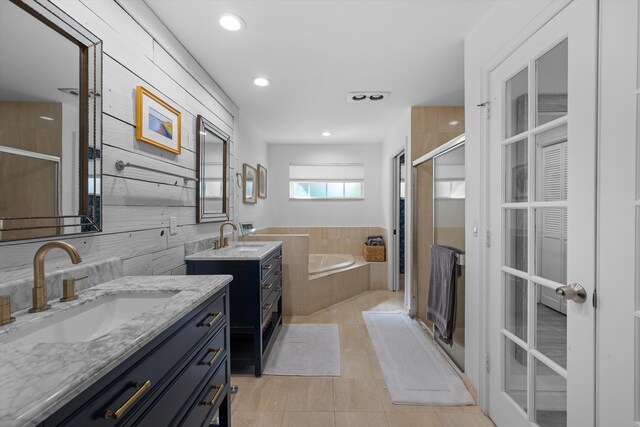 11851 Pebblewood Dr, Wellington, FL 33414 - full bath with a bath, a stall shower, and a sink