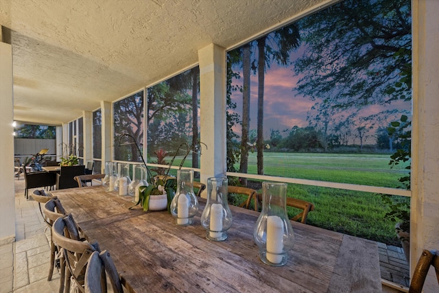 11851 Pebblewood Dr, Wellington, FL 33414 - sunroom / solarium with floor to ceiling windows and a textured ceiling