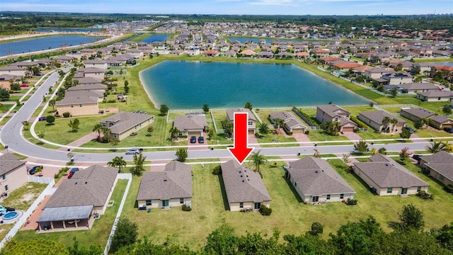 aerial view of property and surrounding area with nearby suburban area