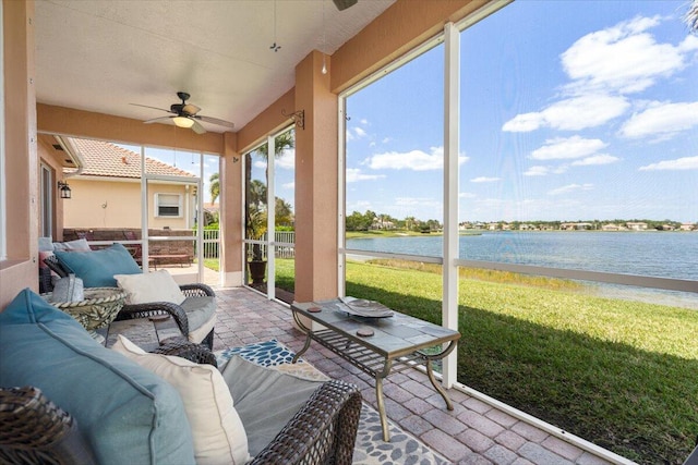 1018 NW Demedici Rd, Port Saint Lucie, FL 34986 - sunroom with ceiling fan, a water view, and an outdoor hangout area