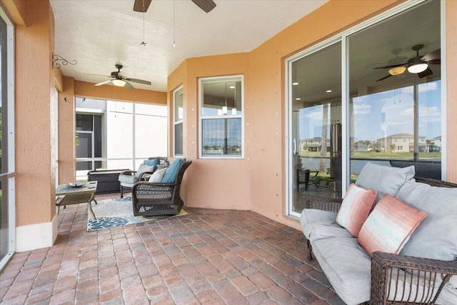 1018 NW Demedici Rd, Port Saint Lucie, FL 34986 - sunroom / solarium with a ceiling fan and outdoor lounge area