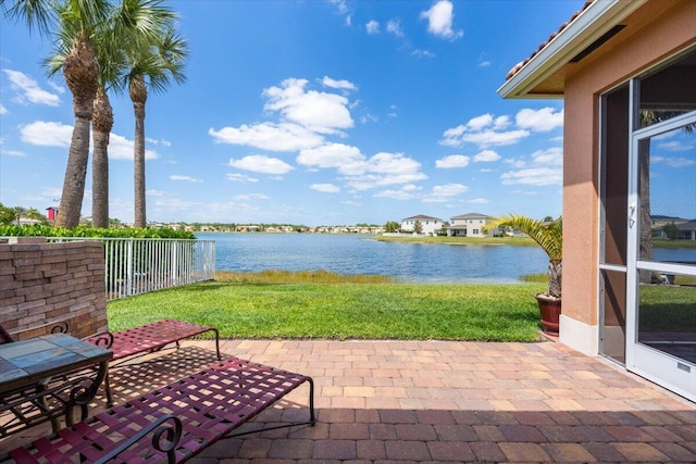 1018 NW Demedici Rd, Port Saint Lucie, FL 34986 - view of patio / terrace featuring a water view