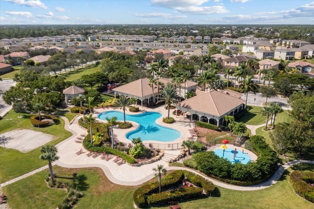 1018 NW Demedici Rd, Port Saint Lucie, FL 34986 - aerial perspective of suburban area featuring a pool