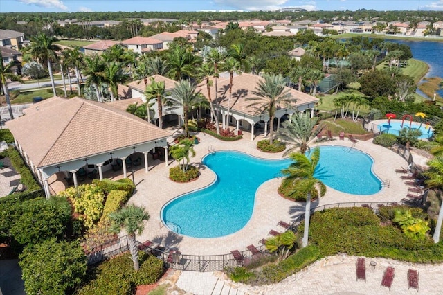 1018 NW Demedici Rd, Port Saint Lucie, FL 34986 - community pool with a residential view and a patio area