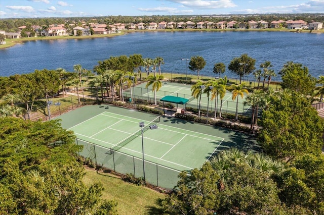 1018 NW Demedici Rd, Port Saint Lucie, FL 34986 - view of tennis court with a water view