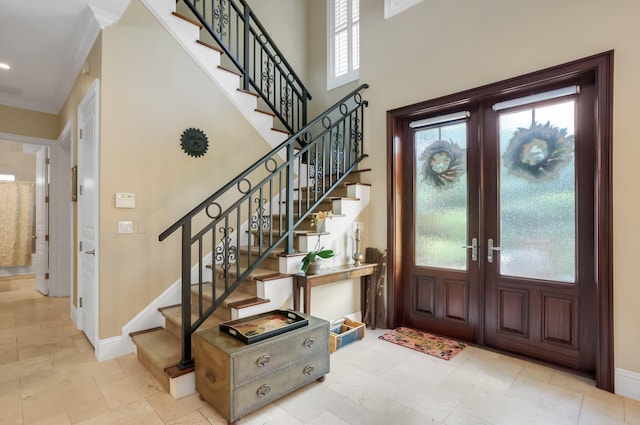 2409 NE 12th St, Fort Lauderdale, FL 33304 - entryway featuring stairway, baseboards, a healthy amount of sunlight, and french doors