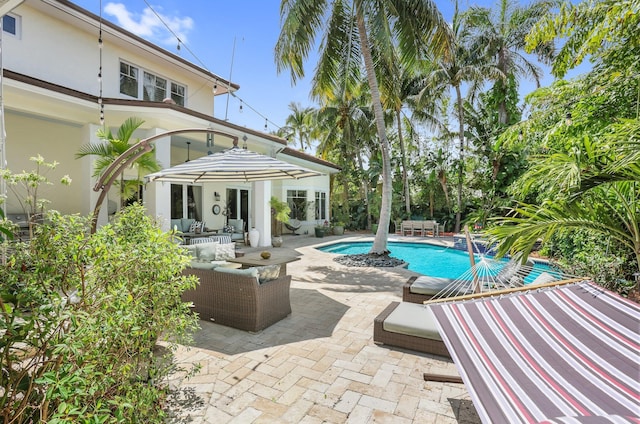 2409 NE 12th St, Fort Lauderdale, FL 33304 - pool featuring an outdoor living space and a patio area