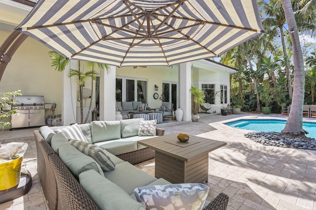 2409 NE 12th St, Fort Lauderdale, FL 33304 - view of patio / terrace featuring an outdoor pool, an outdoor hangout area, and area for grilling