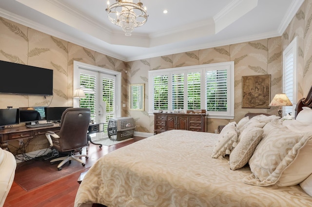 2409 NE 12th St, Fort Lauderdale, FL 33304 - bedroom with wallpapered walls, wood finished floors, access to outside, crown molding, and a raised ceiling