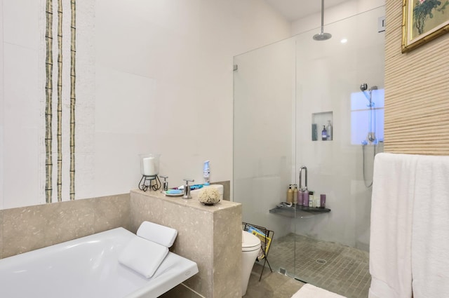 2409 NE 12th St, Fort Lauderdale, FL 33304 - full bathroom with toilet, tile patterned floors, and a stall shower