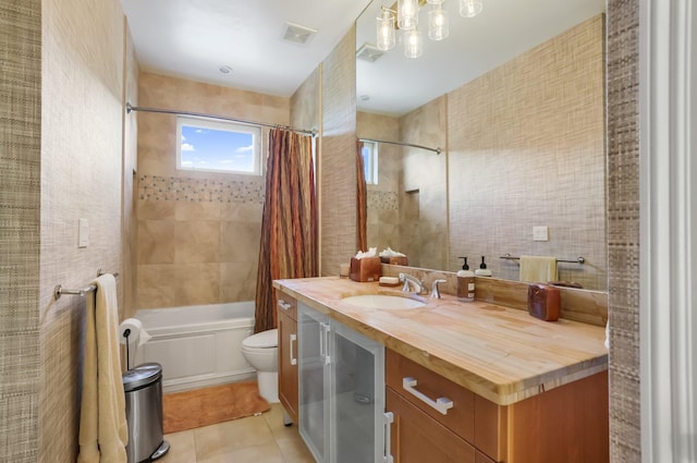2409 NE 12th St, Fort Lauderdale, FL 33304 - bathroom with tile patterned flooring, visible vents, toilet, vanity, and shower / tub combo