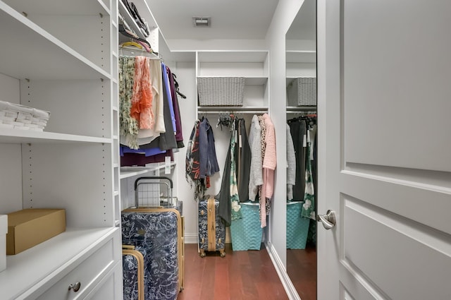 2409 NE 12th St, Fort Lauderdale, FL 33304 - walk in closet featuring wood finished floors