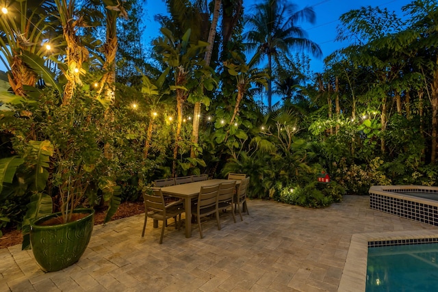 2409 NE 12th St, Fort Lauderdale, FL 33304 - view of patio featuring an outdoor pool, an outdoor hot tub, and outdoor dining space