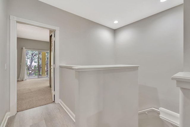 3216 W Community Dr, Jupiter, FL 33458 - hall with light wood-style floors, recessed lighting, baseboards, and an upstairs landing