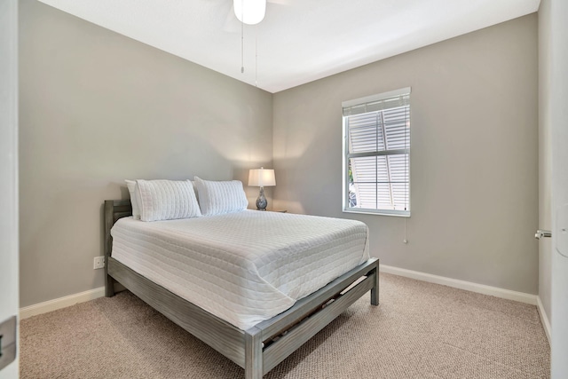 3216 W Community Dr, Jupiter, FL 33458 - bedroom featuring light carpet and baseboards