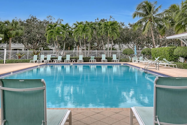 3216 W Community Dr, Jupiter, FL 33458 - community pool featuring a patio