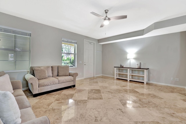 3216 W Community Dr, Jupiter, FL 33458 - living room with baseboards and ceiling fan