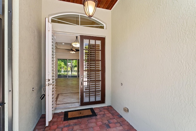 doorway to property with stucco siding