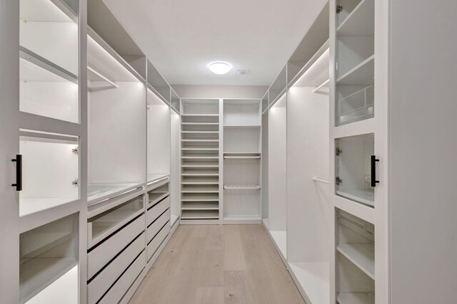5214 SW Pomegranate Way, Palm City, FL 34990 - spacious closet with light wood-style floors