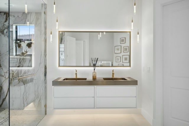 5214 SW Pomegranate Way, Palm City, FL 34990 - full bath with double vanity, a marble finish shower, and a sink