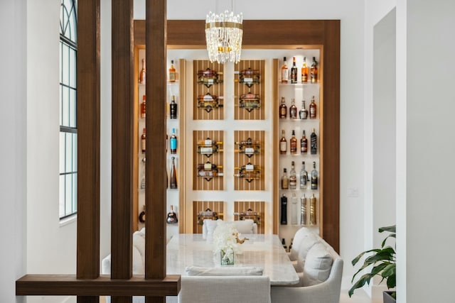 5214 SW Pomegranate Way, Palm City, FL 34990 - wine area with a dry bar and a chandelier