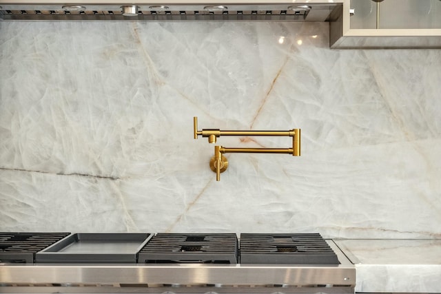 5214 SW Pomegranate Way, Palm City, FL 34990 - room details featuring range and tasteful backsplash