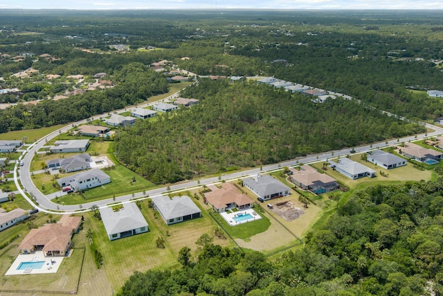 5214 SW Pomegranate Way, Palm City, FL 34990 - drone / aerial view featuring a residential view and a forest view