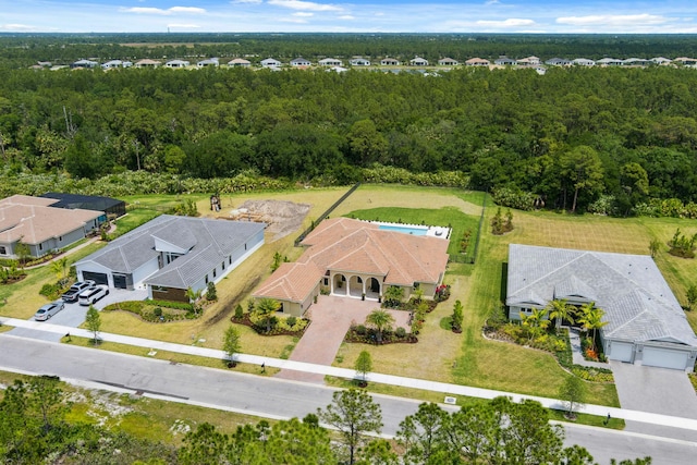 5214 SW Pomegranate Way, Palm City, FL 34990 - birds eye view of property with a residential view and a forest view