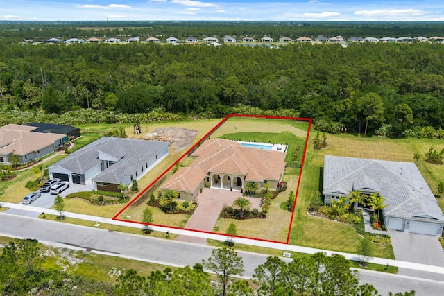 5214 SW Pomegranate Way, Palm City, FL 34990 - birds eye view of property with a view of trees and a residential view