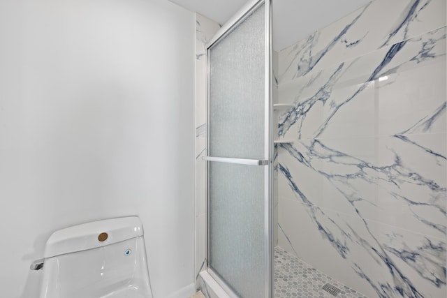 3526 Whitehall Dr Unit 106, West Palm Beach, FL 33401 - bathroom featuring a shower stall and toilet