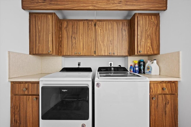 3526 Whitehall Dr Unit 106, West Palm Beach, FL 33401 - laundry room with independent washer and dryer and cabinet space