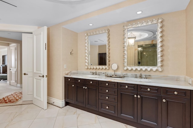 2500 S Ocean Blvd Unit Ph2, Boca Raton, FL 33432 - bathroom with marble finish flooring, double vanity, baseboards, recessed lighting, and a shower