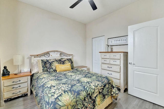 bedroom featuring ceiling fan and light wood-style flooring