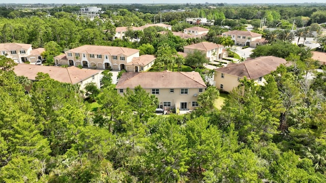 birds eye view of property with a residential view