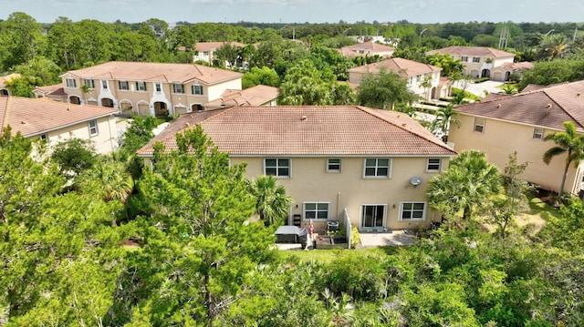 birds eye view of property with a residential view