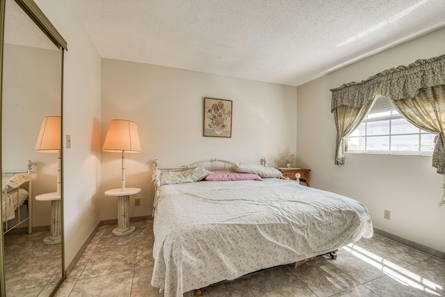 4281 NW 41st St Unit 320, Lauderdale Lakes, FL 33319 - bedroom with a textured ceiling