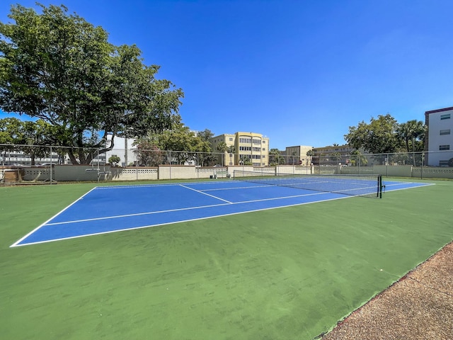 4281 NW 41st St Unit 320, Lauderdale Lakes, FL 33319 - view of tennis court with fence and community basketball court