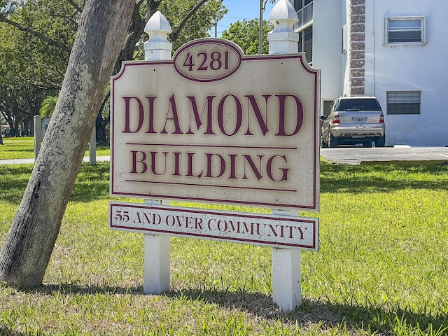4281 NW 41st St Unit 320, Lauderdale Lakes, FL 33319 - community / neighborhood sign featuring a lawn