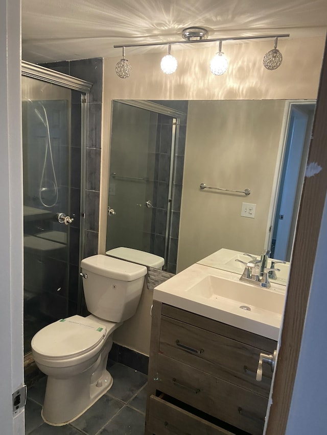 1040 SE 4th Ave Unit 222, Deerfield Beach, FL 33441 - bathroom featuring toilet, vanity, tile patterned floors, and a stall shower